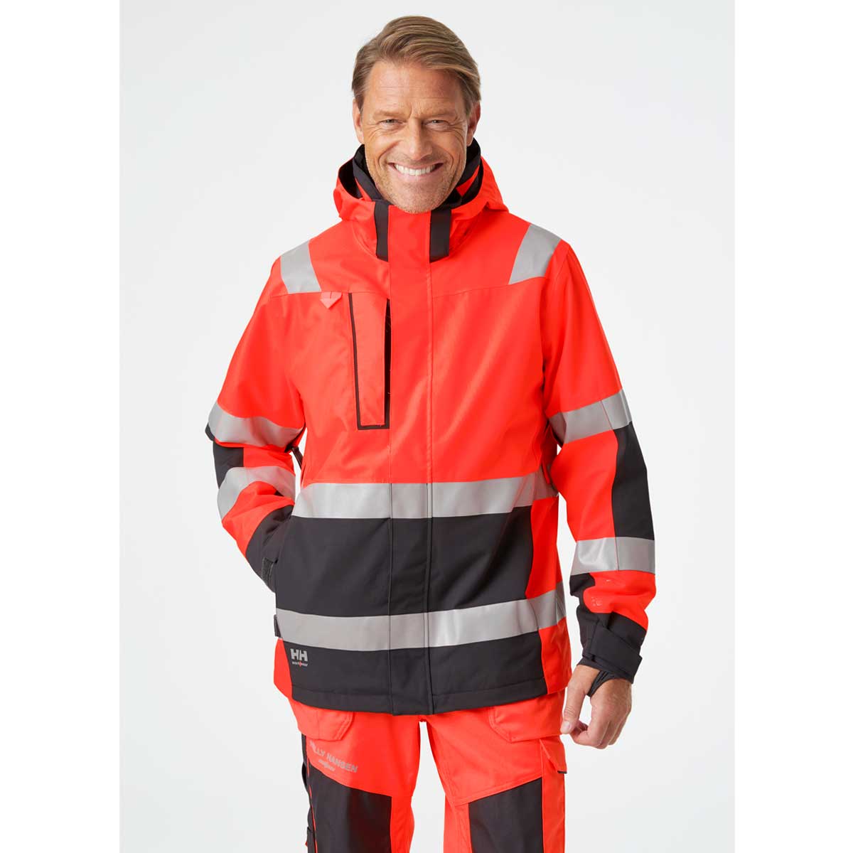 Helly Hansen Alna 2.0 Hi Vis Shell Jacket - red on model